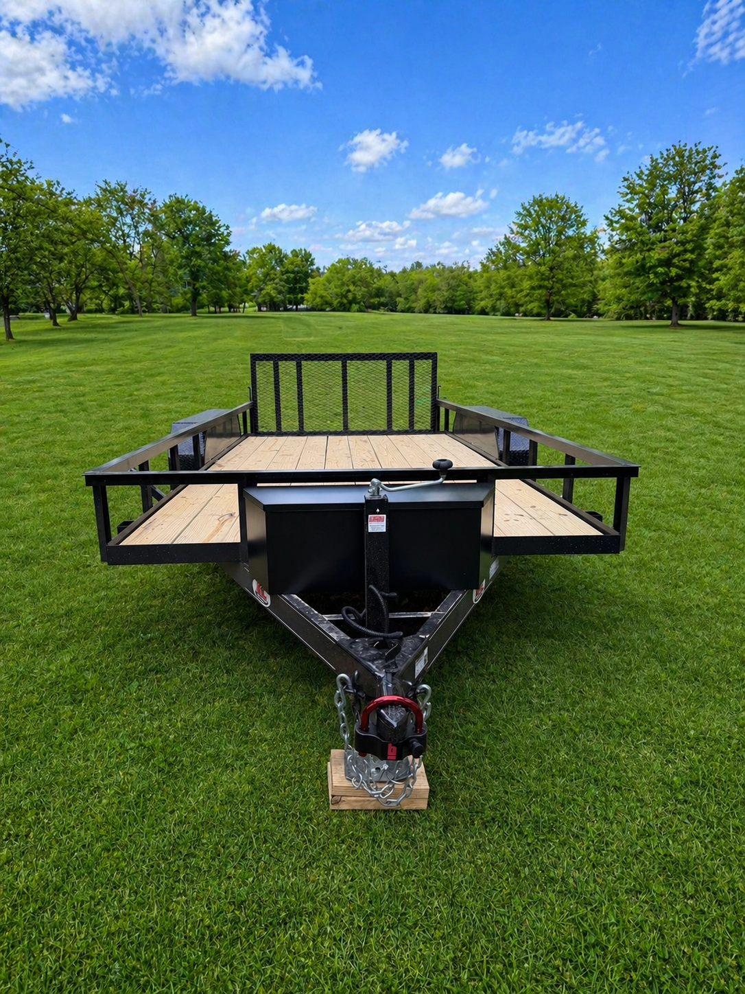 KL utility trailer front hitch view with coupler, jack and safety chains