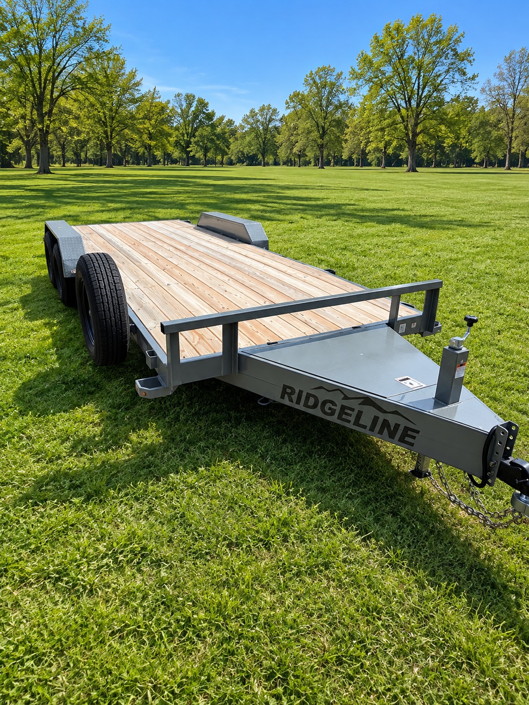 2026 Ridgeline car hauler trailer front angle showing wood deck and Ridgeline branding