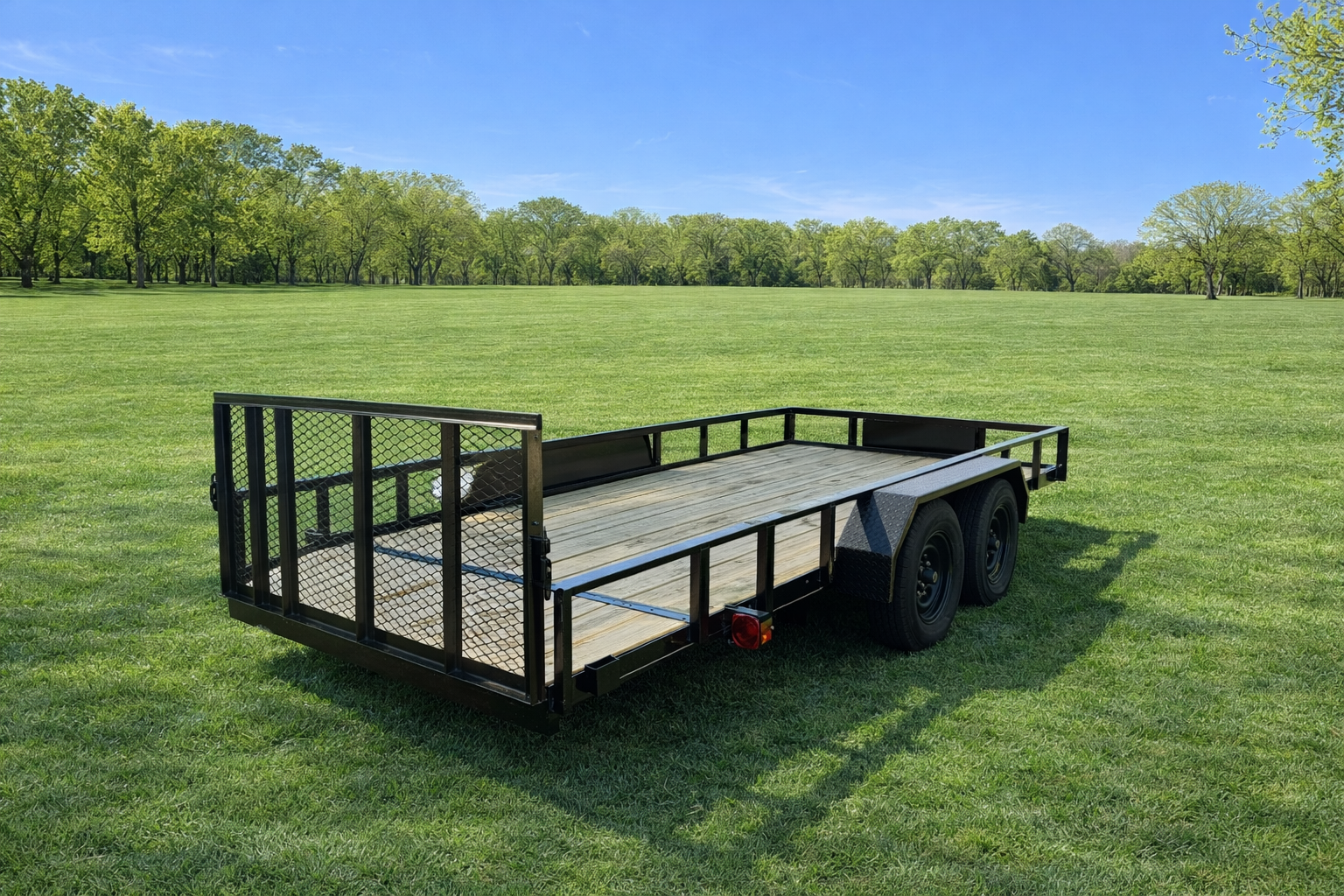 Utility trailer in field side view