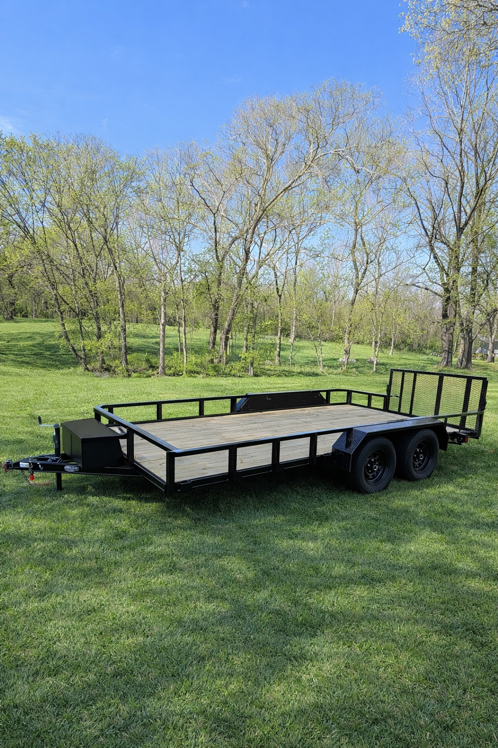 Utility trailer in field angle view